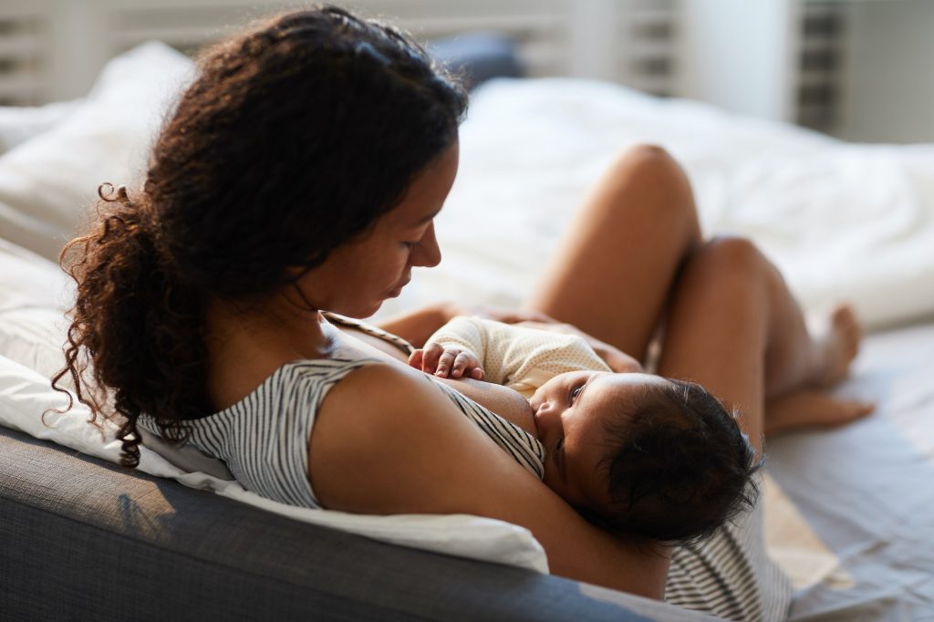 Mother feeding baby with breast