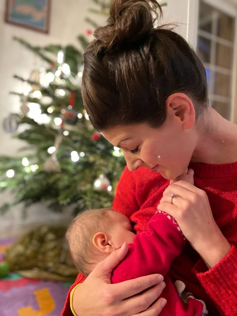 Emily Hardwick breastfeeding at Christmas 
