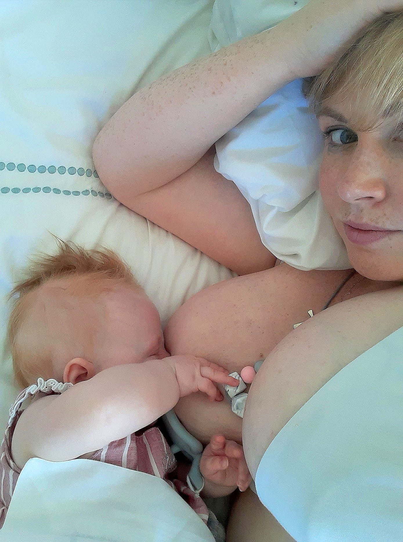 breastfeeding mother side lying with baby