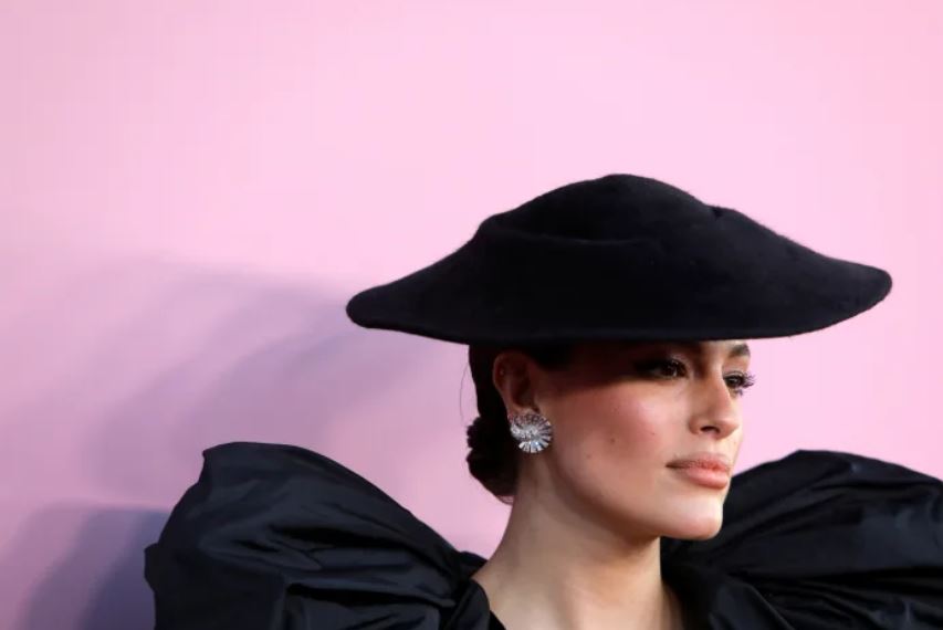 Ashley Graham wearing black hat