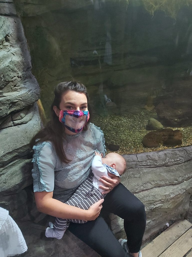 Grace Redmond feeds her son at Aquarium