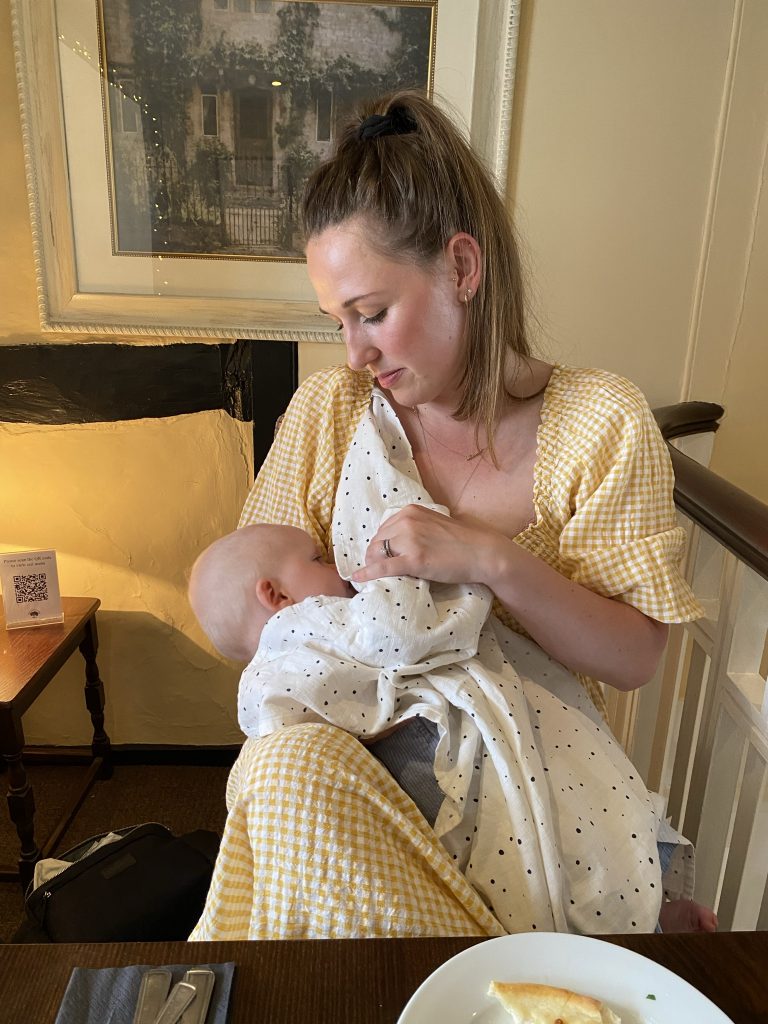 Amee Gosney breastfeeding her baby and recovering from a traumatic birth