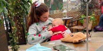 Grace breastfeeding at Christmas