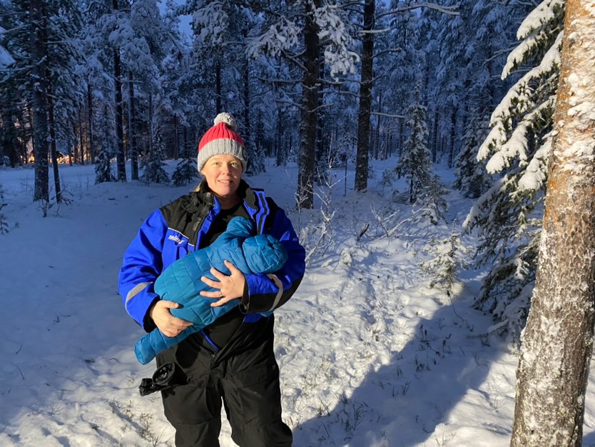 Charlotte Wayman breastfeeding son in Lapland