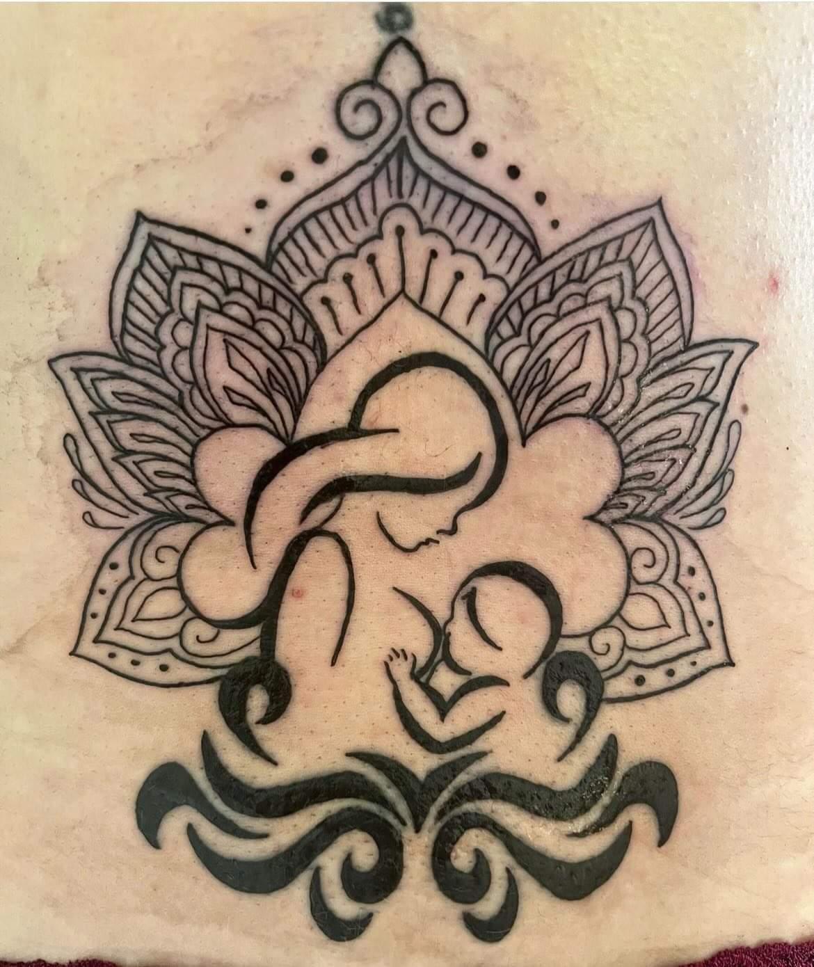 Snake tattoo on the breast