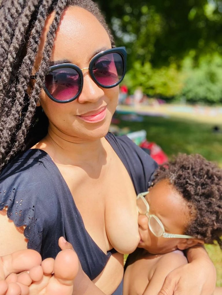 Danielle Facey from The Breastfeeding Mentor breastfeeding toddler son in sunshine