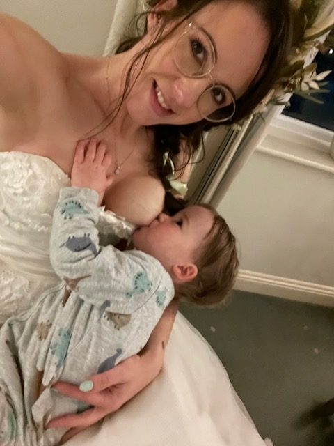 Natalie Martindale breastfeeding at wedding