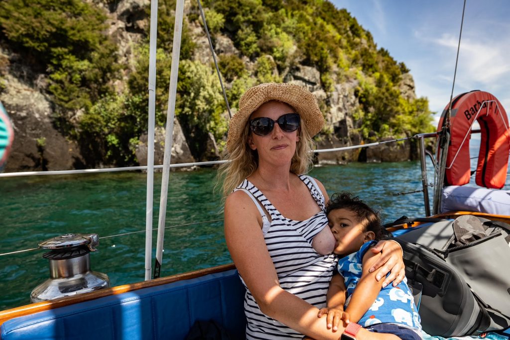 Breastfeeding in picturesque places - Ebonie Chandraraj at Lake Taupo