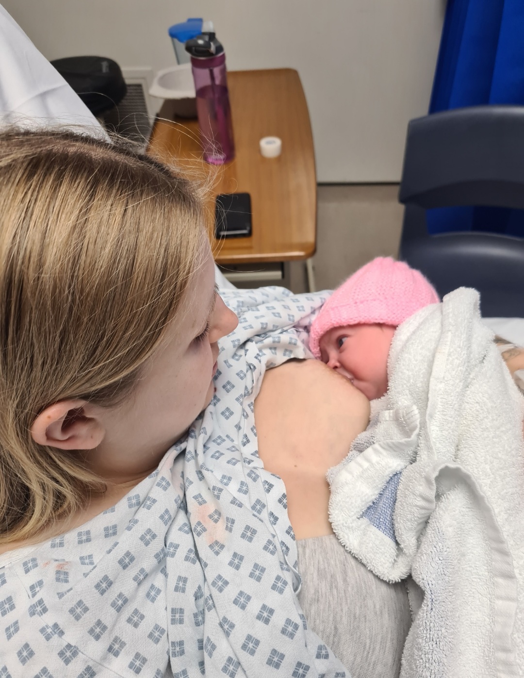 Joanna breastfeeding her newborn daughter in hospital