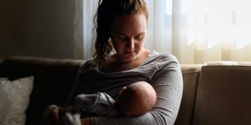 Woman breastfeeding her baby