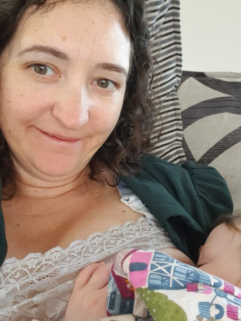 Petrina' O'Halloran breastfeeding her toddler daughter