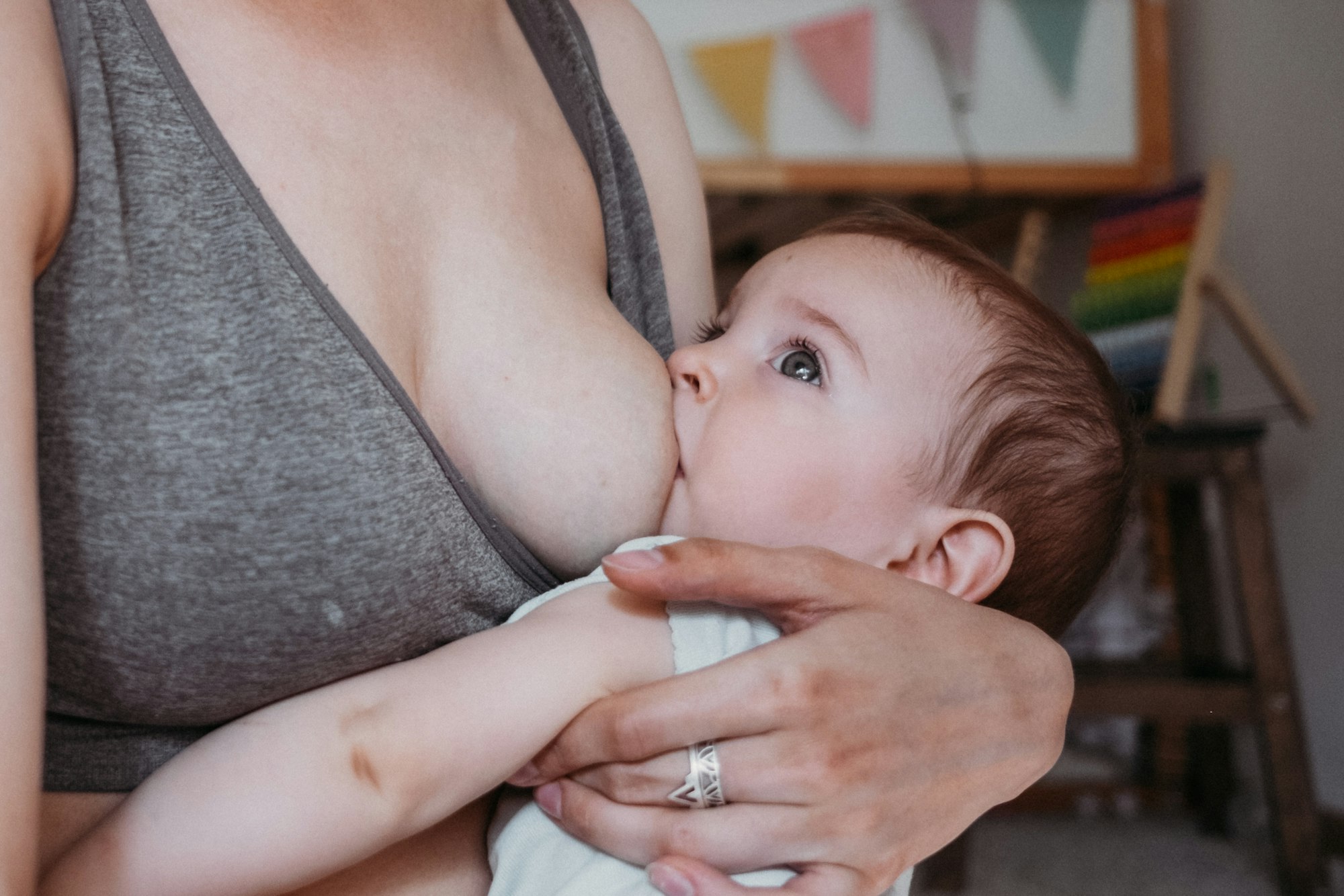 Woman breastfeeding her little baby