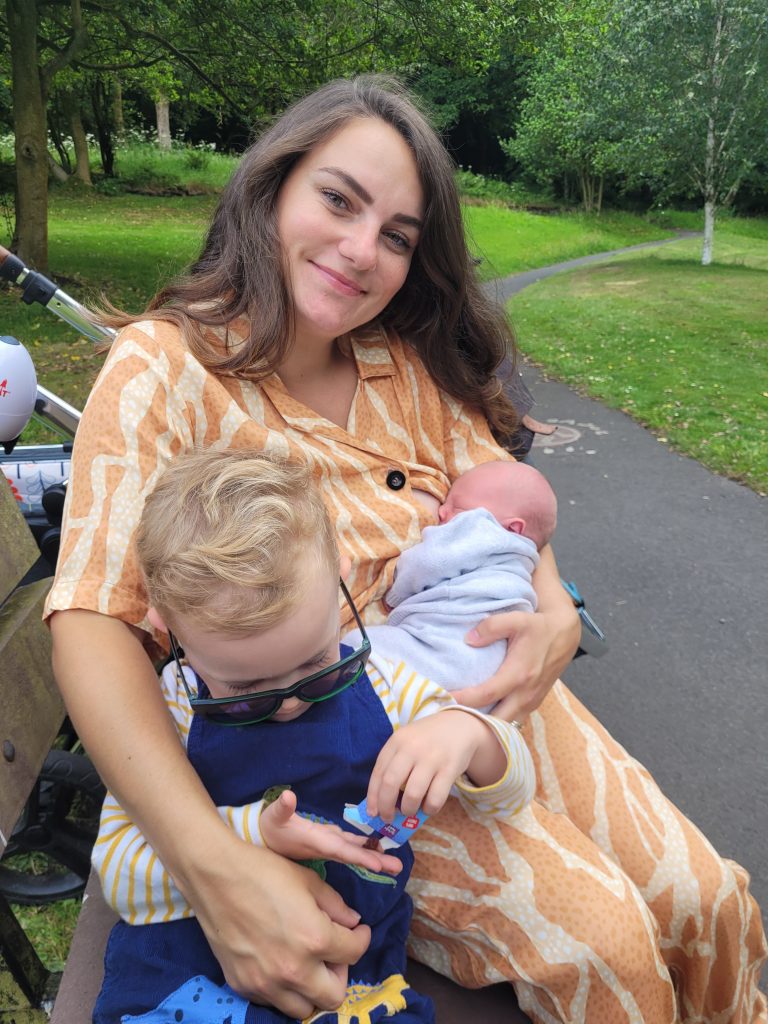 Grace Redmond breastfeeding baby son