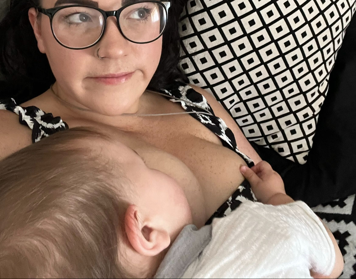Photo of baby nipple twiddling whilst breastfeeding