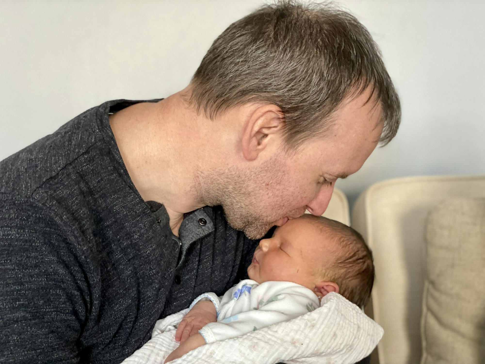 Dad with newborn baby