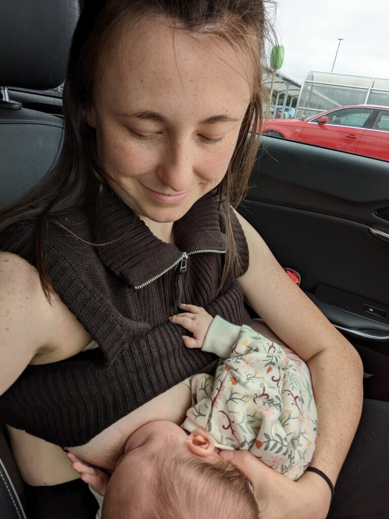 Megan Girvan breastfeeding in the car