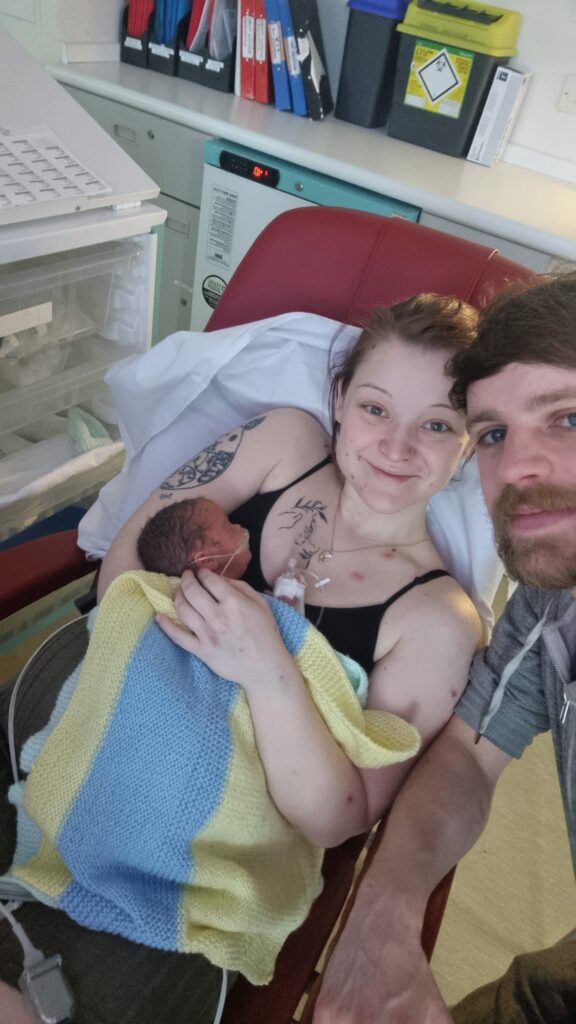 Sophie and Partner in hospital with their son Charlie, born at 29 weeks