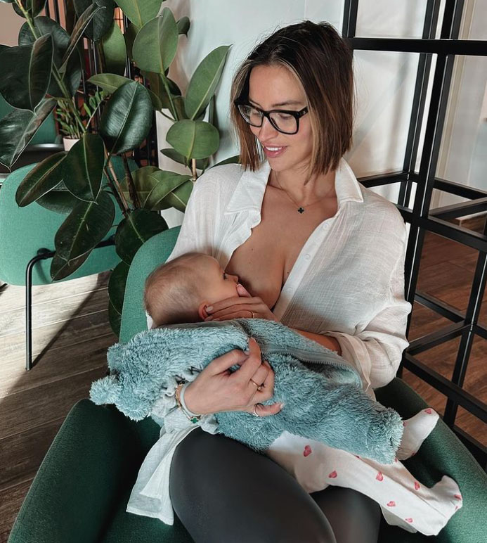 Fern McCann breastfeeds baby Finty