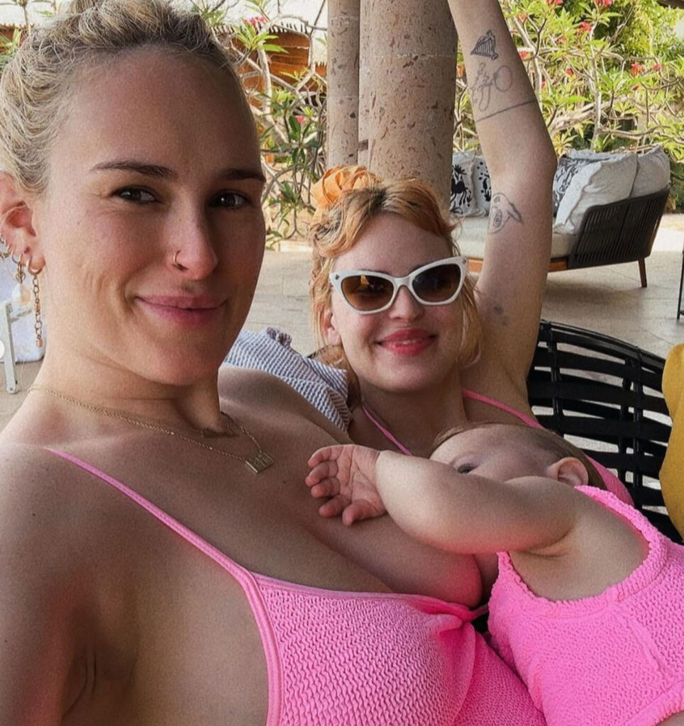 Rumer Willis breastfeeding in pink swimsuit