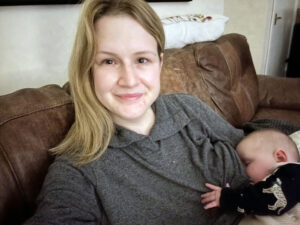 terri breastfeeding on the sofa