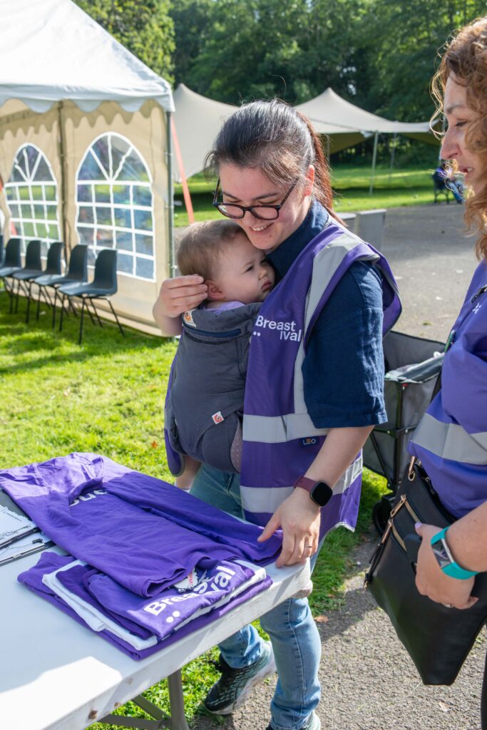 Breastival volunteer with baby