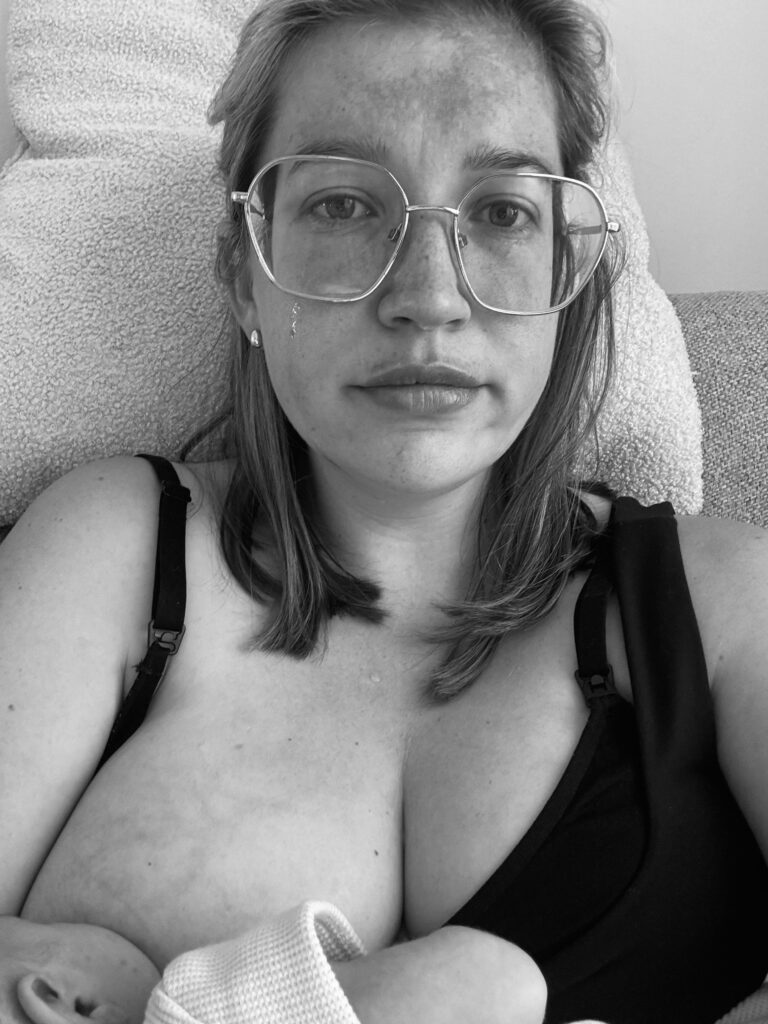 Megan breastfeeding newborn baby
