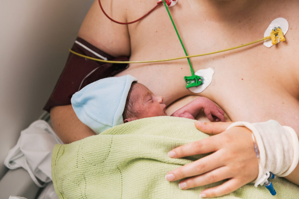 Image of mothers and newborn baby practising kangaroo mother care in hospital