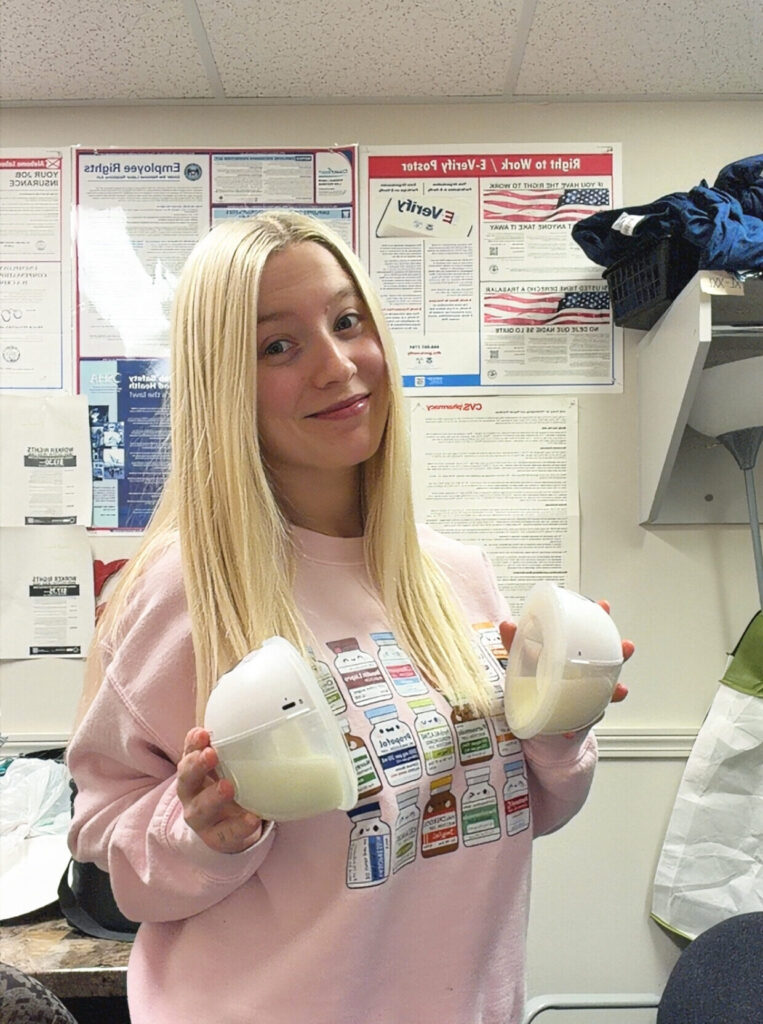 Jade at work after expressing milk with her wearable pumps 