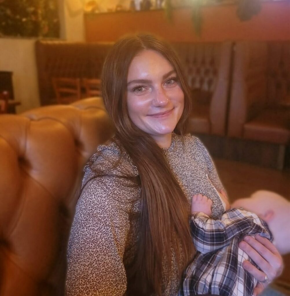 Grace Redmond breastfeeding son in public, in a restaurant