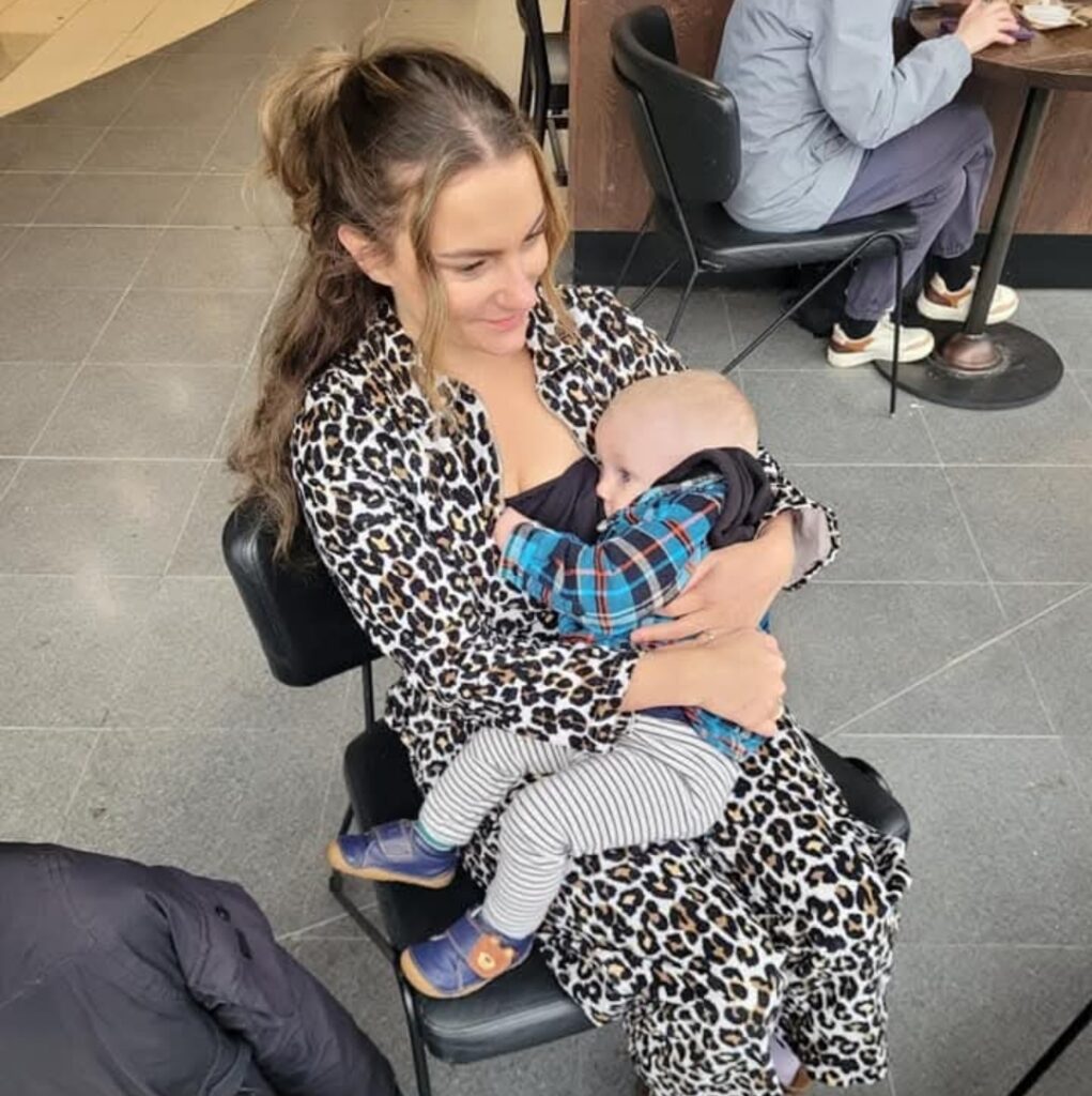 Grace Redmond breastfeeding in public with son
