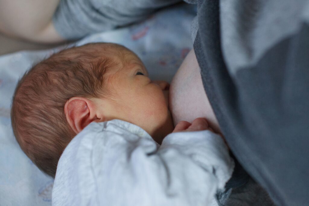 newborn feeding at the breast