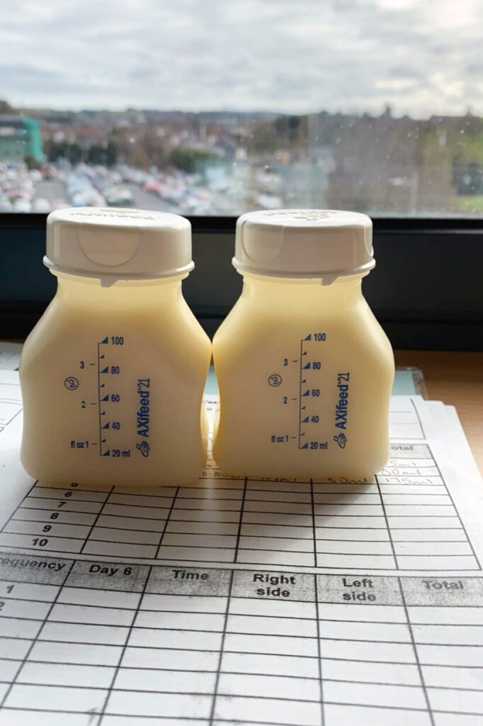 Image of two breast milk storage bottles full pf expressed breast milk